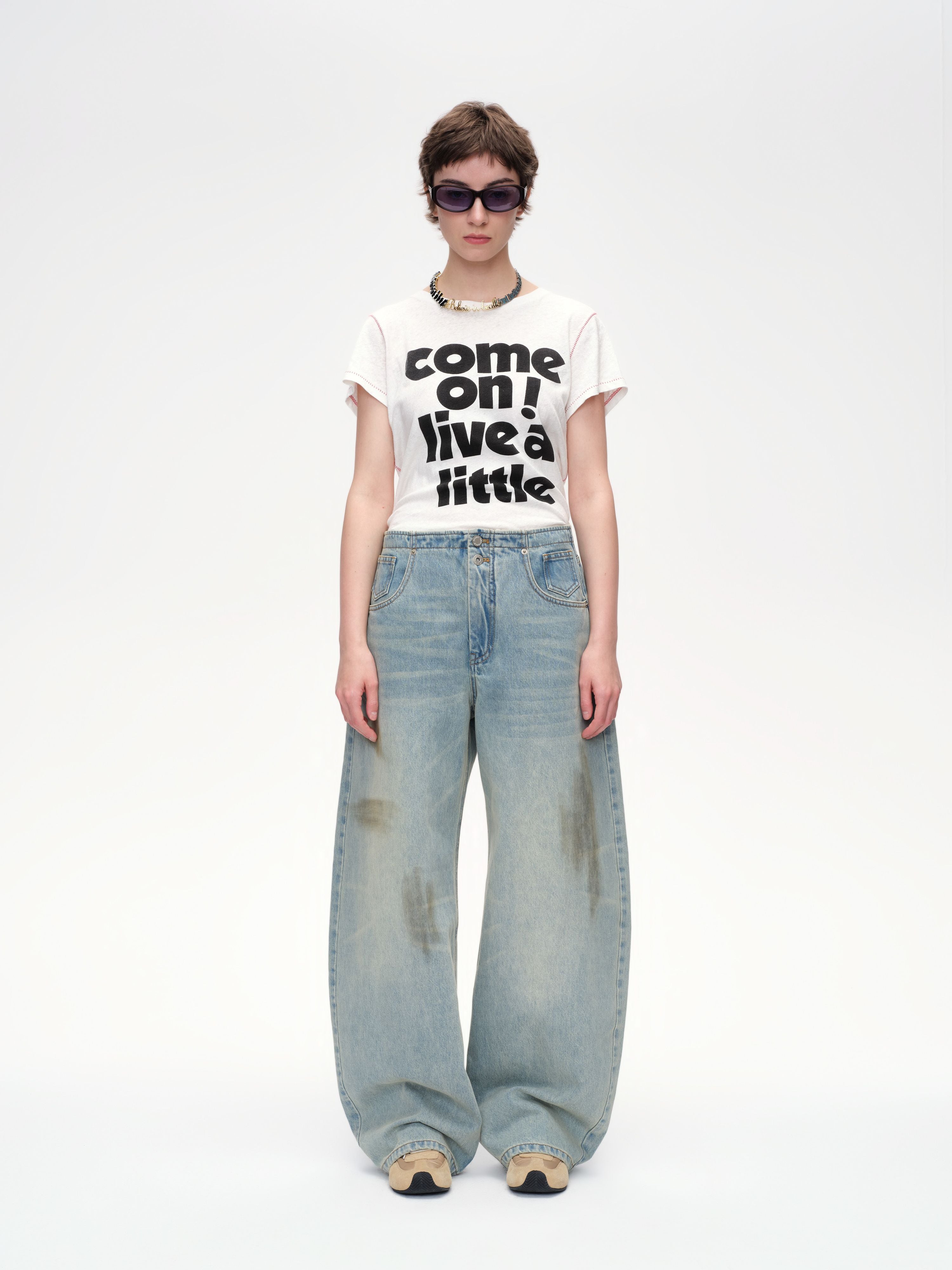 curved-hem-denim-trousers-1-image.jpg
