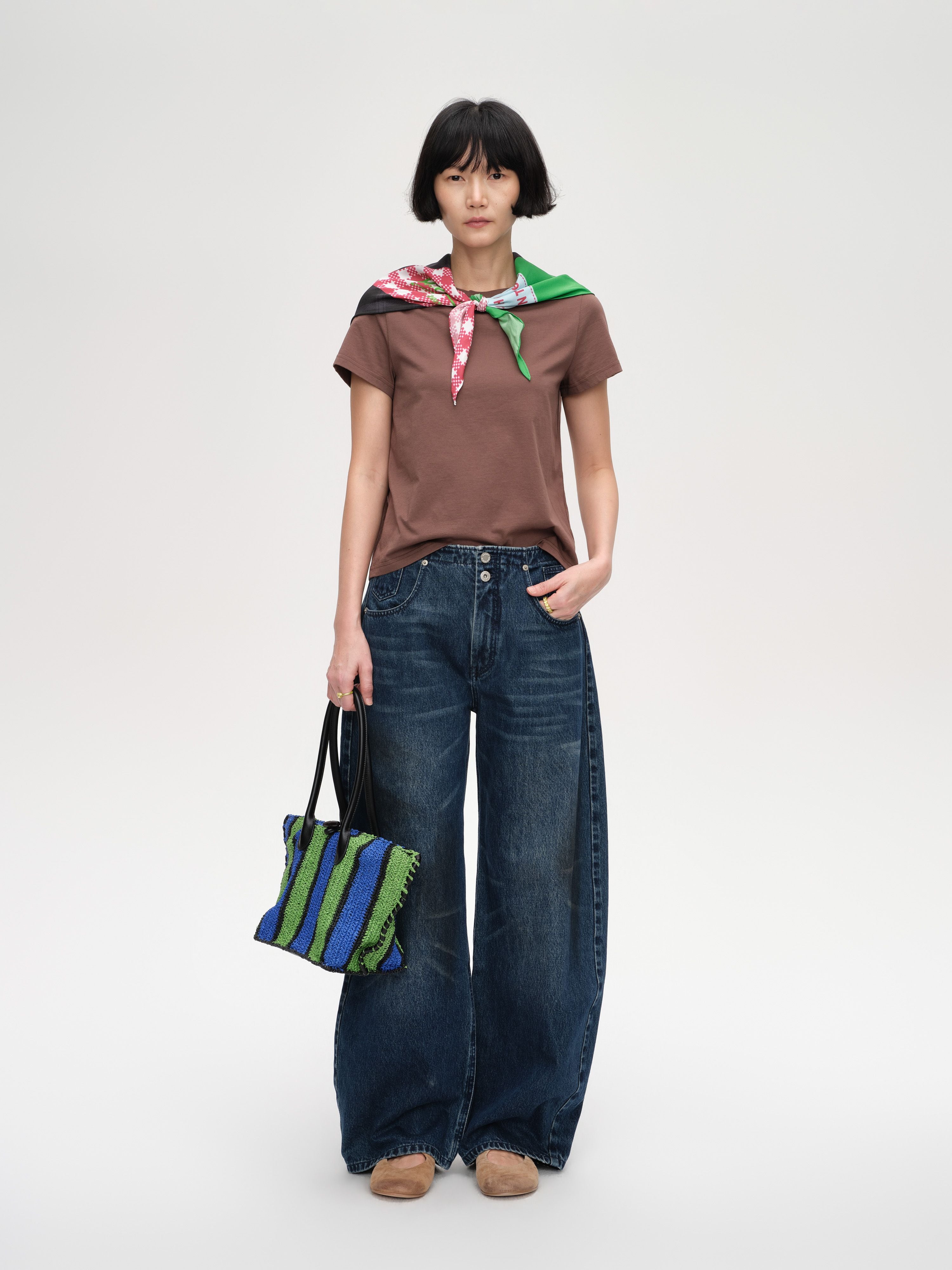 curved-hem-denim-trousers-image.jpg