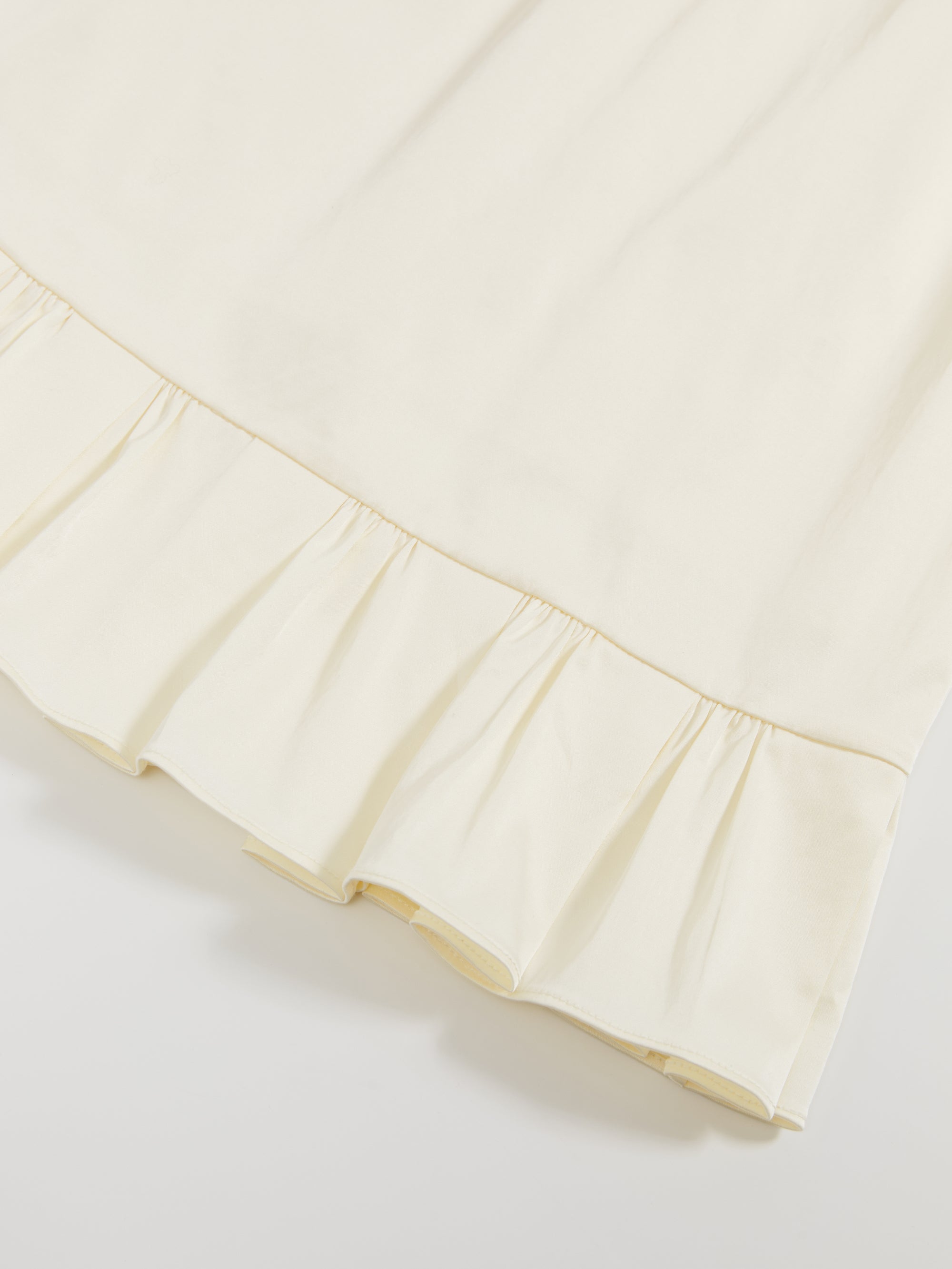 Ruffled tie-up glossy midi skirt